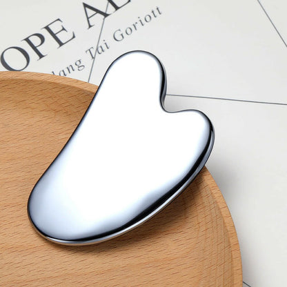 https://cdn.shopify.com/s/files/1/0707/6121/8361/files/sculpting-pro-stainless-steel-gua-sha-tool-395795.jpg?v=1713488469